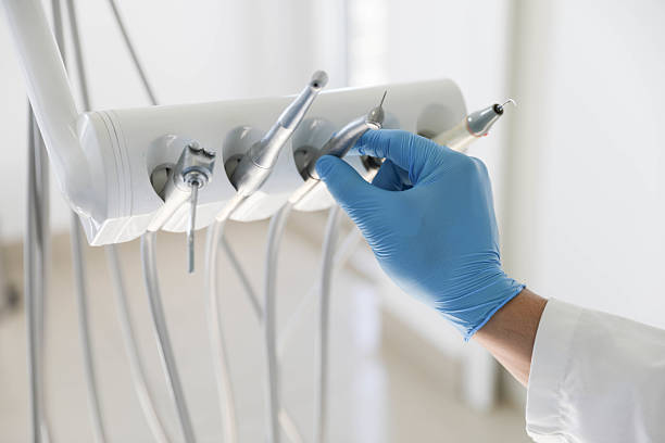 Professional Invisalign Clear Aligners technician working in Watertown Town, MA